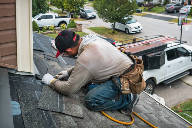 Professional Flat Roof Repair technician working in Grandview, IN